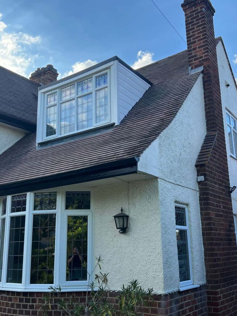 This is a photo of a dormer window which has just had some repairs carried out where the roof and the dormer meet. Works carried out by Haywards Heath Roofing Repairs